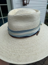 Light hat with stacked blues and creams