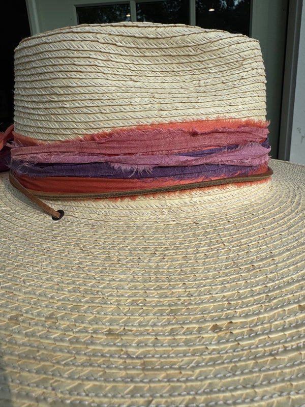 Light hat with layered coral, purple