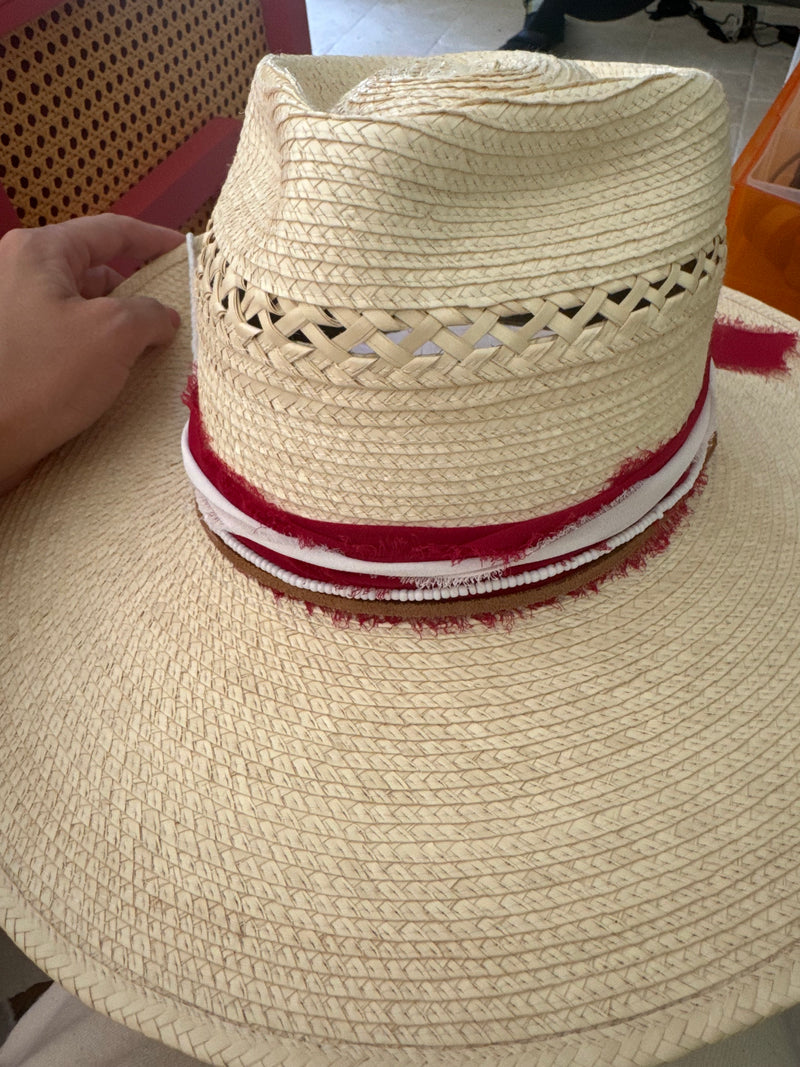 Light vented hat with red, white ribbons, white beads